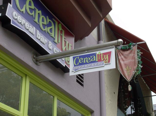 Cereality Cereal Bar & Cafe Blade sign acrylic background with full color digital graphics on second acrylic panel Santa Cruz, California, San Francisco Bay Area, Santa Cruz County 2