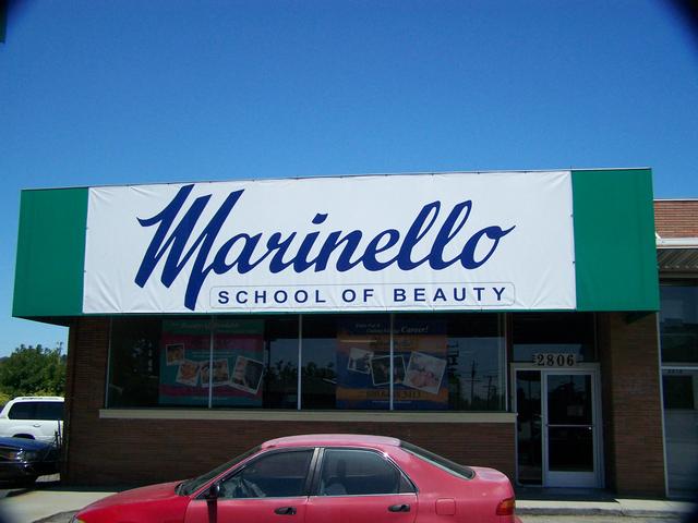 Marinello School of Beauty Banner vinyl background, hemmed & grommeted edges, vinyl letters Hayward, California, San Francisco Bay Area 6